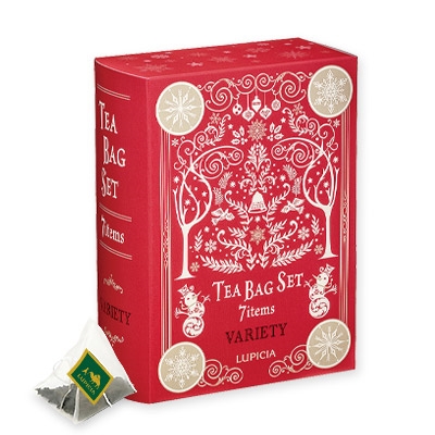 A red boxed package labeled "Tea Bag Set 7items VARIETY" with a single tea bag displayed beside it.