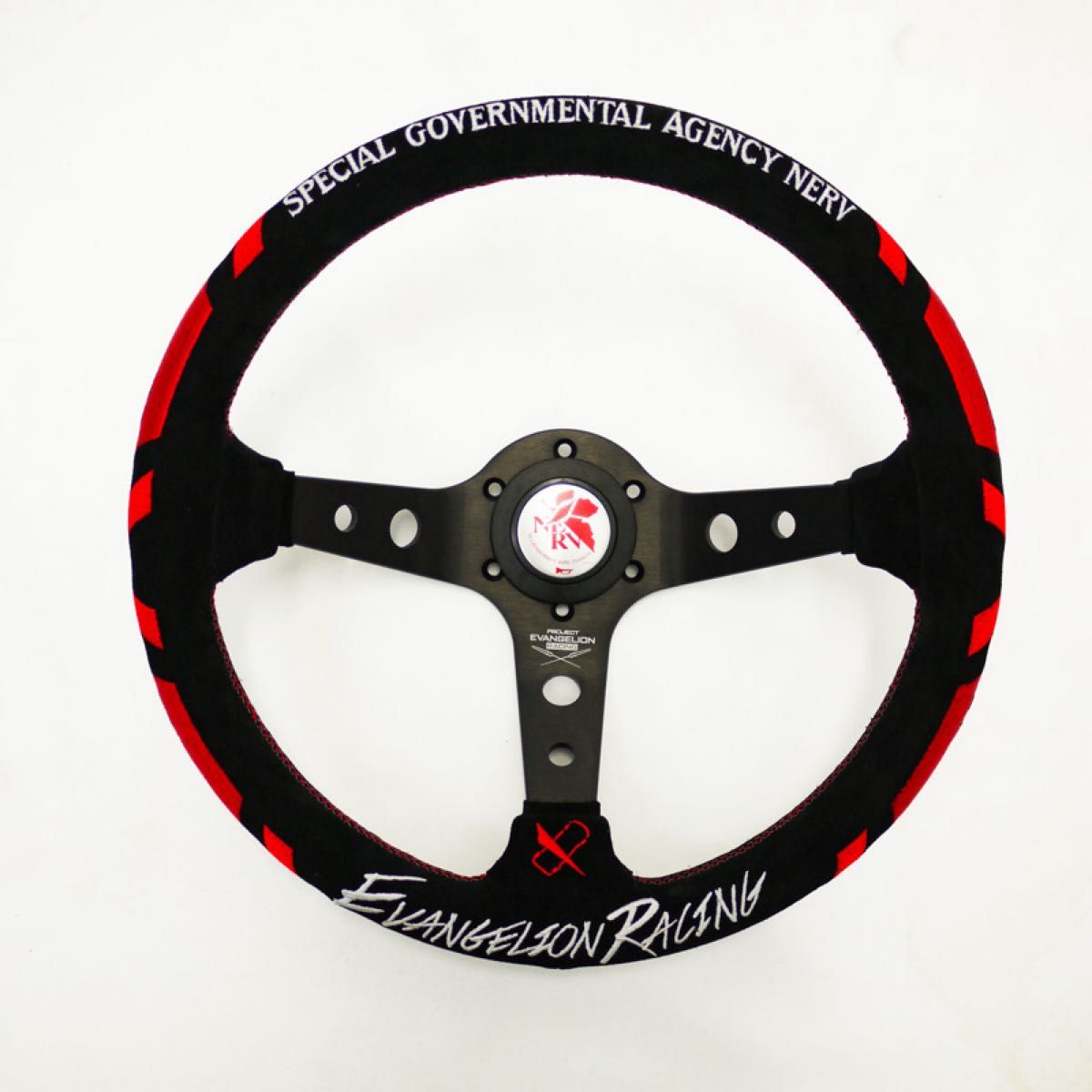 Front view of the VERTEX × EVANGELION RACING steering wheel (no airbag), black with red accents and NERV/EVANGELION RACING branding.