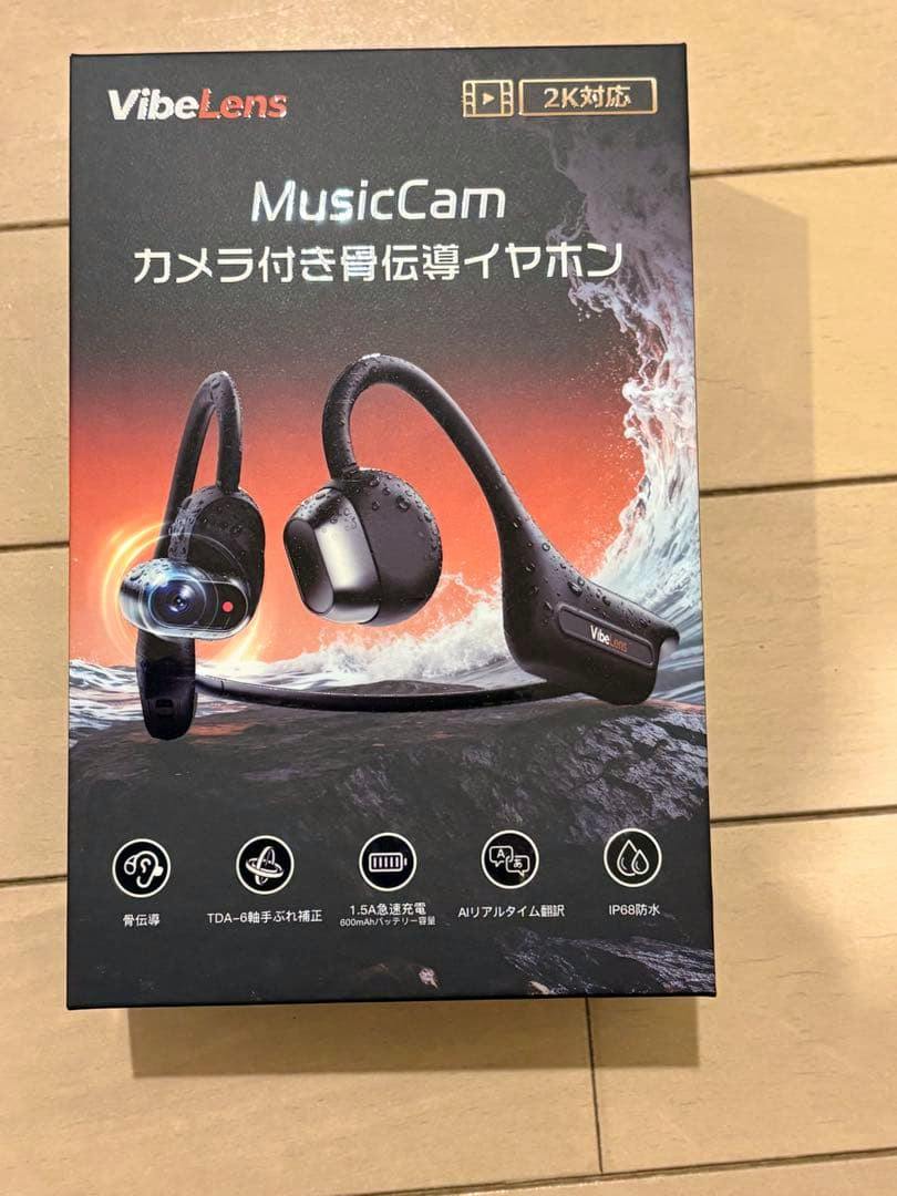 Front of the VibeLens MusicCam product box showing an image of the camera-equipped bone conduction earphones.