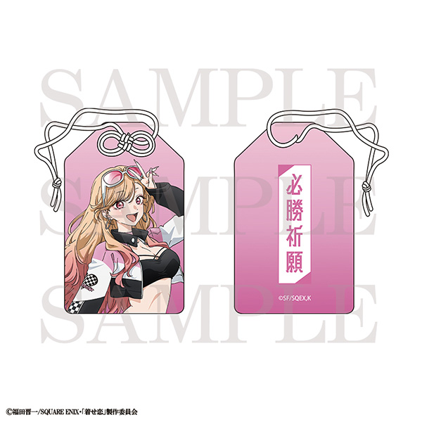 Front and back of a pink omamori charm showing an illustrated female character on the front and the kanji "必勝祈願" on the back.