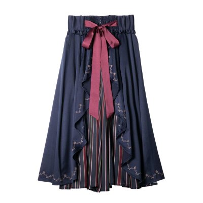 Front view of a navy women's skirt (polyester) with ruffled front panels, a striped inner panel, and a burgundy ribbon waist tie.