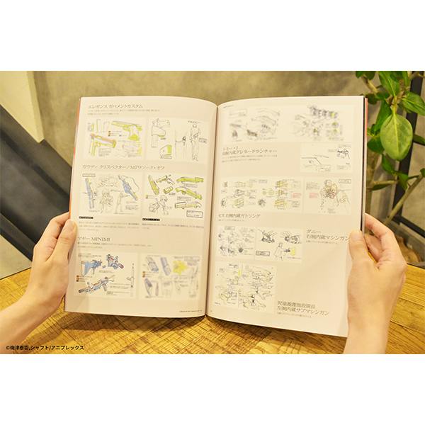 Open 『ヴァージン・パンク』劇場パンフレット held open by hands showing illustrated interior pages.