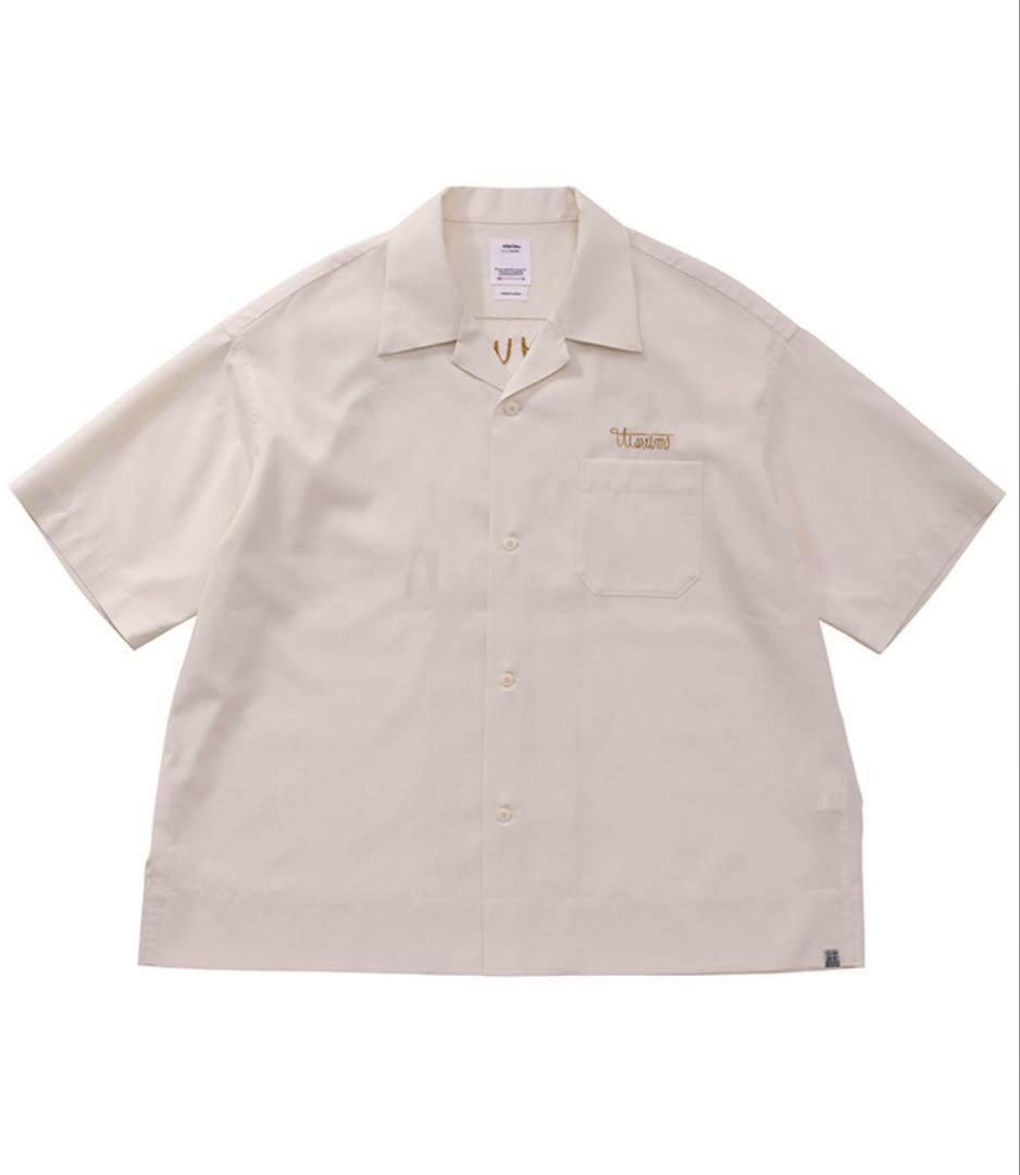 Front view of the visvim COPA silk short-sleeve shirt in natural/cream color laid flat, showing buttons, chest pocket, and collar.
