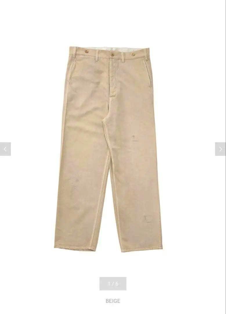 Beige visvim ALPER PANTS laid flat on a white background, photographed full-length.
