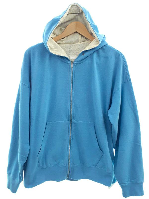 Front view of a blue zip-up hooded sweatshirt on a hanger showing the hood, zipper, and front pockets.