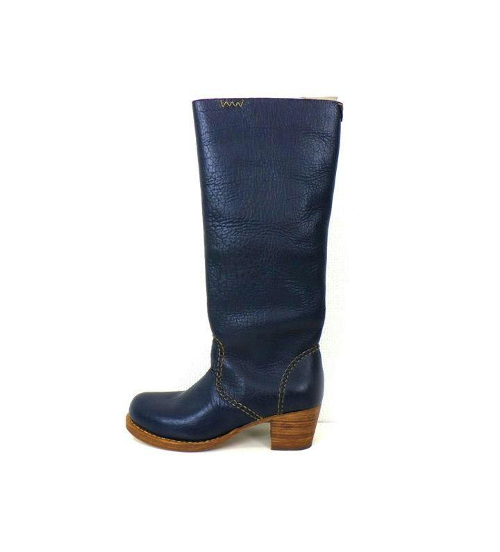 Side view of a single visvim Rosebud long leather boot in dark blue with a stacked wooden heel.