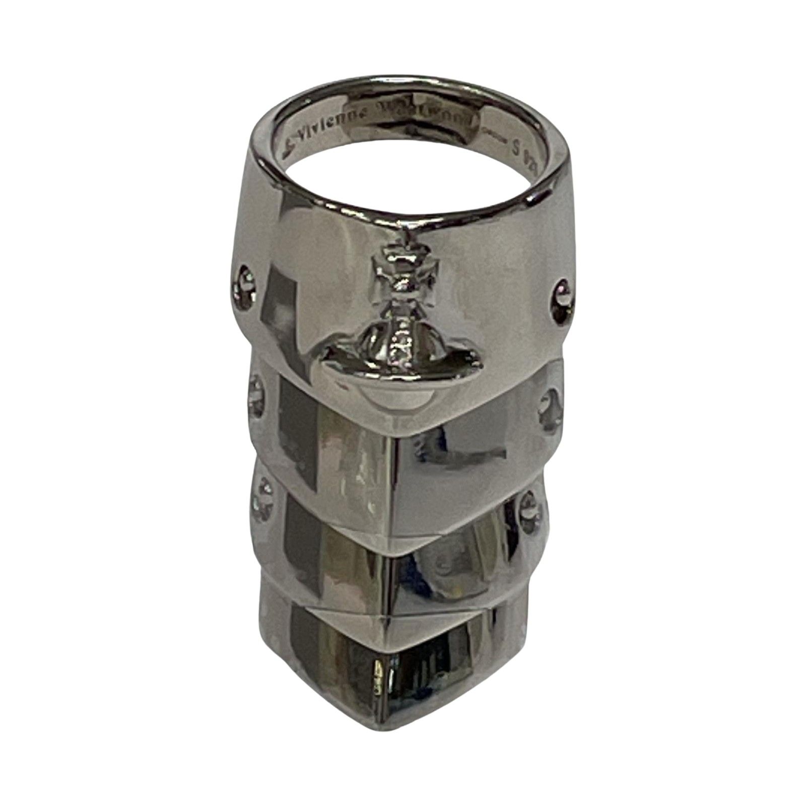 Close-up photo of a silver Vivienne Westwood armor-style ring showing stacked segmented design and orb logo.