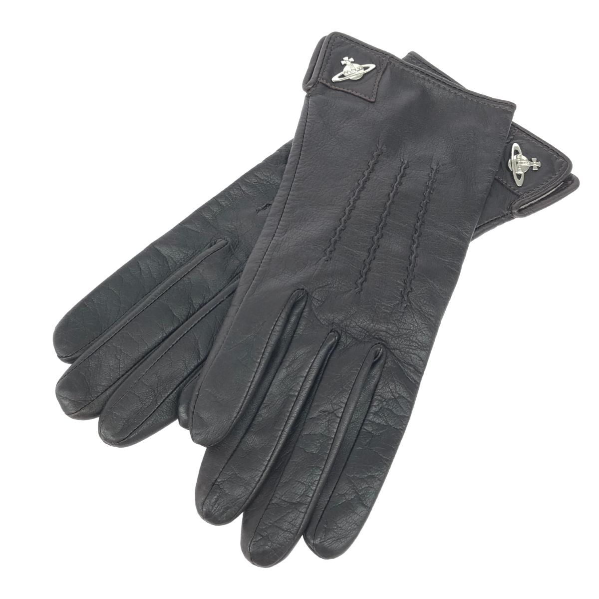 Vivienne Westwood women's cow leather gloves with orb metal hardware in brown displayed flat.