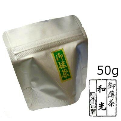 Aluminum resealable pouch of matcha green tea with a green label and a visible "50g" marking.