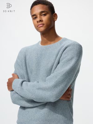 A model wearing the washable 3D crew-neck sweater.