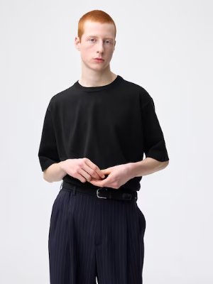 Model wearing the washable knitted half-sleeve T-shirt shown from the front.