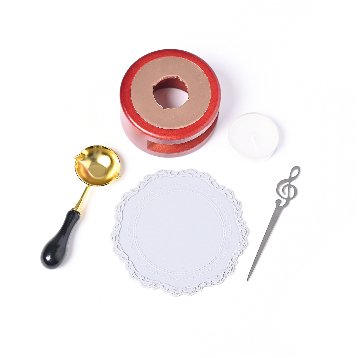 Sealing stamp item set on a white background showing a wooden stamp holder, a small melting spoon with black handle, a tealight candle, and a decorative round seal mat.