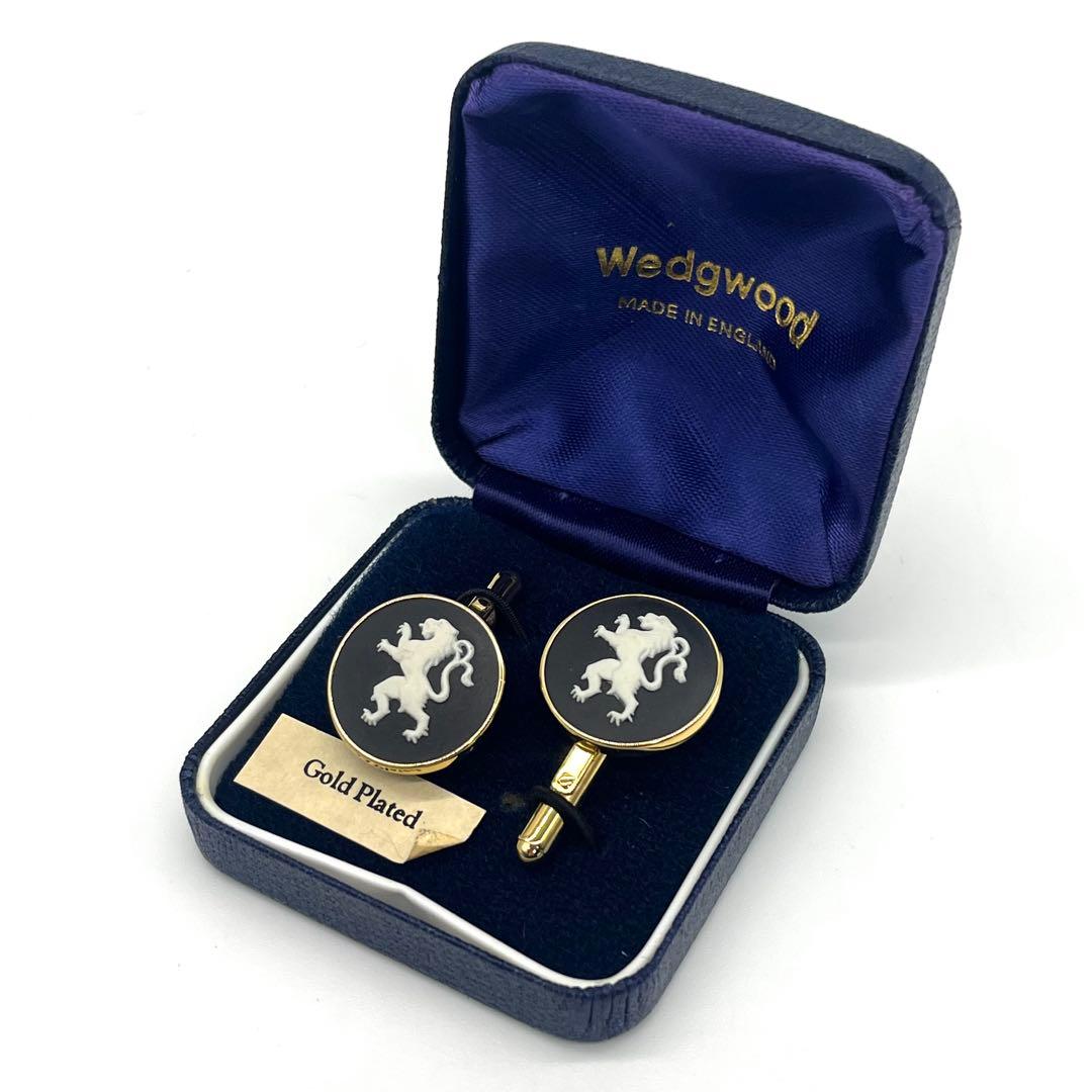 Gold-plated Wedgwood ceramic cameo cufflinks with a lion design displayed inside their presentation box.