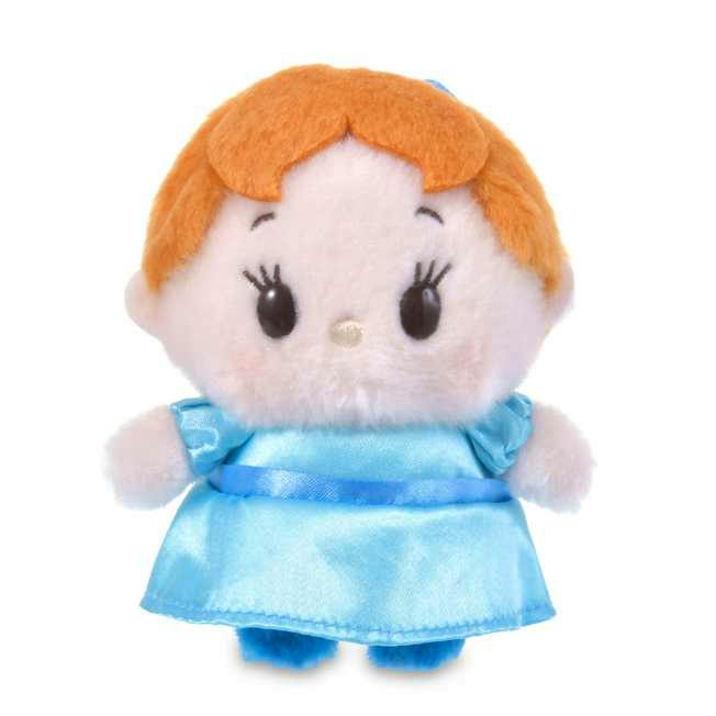 Front view of a Wendy plush toy wearing a light blue dress against a white background.