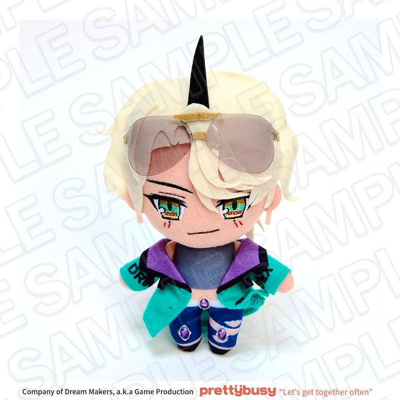Front view of the 17.5cm Belzebub plush toy wearing sunglasses, blond hair, and a teal jacket with printed facial features.