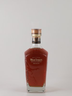 Front photo of the Wild Turkey マスターズ キープ ビーコン 59度 glass bottle filled with amber liquid on a white background.