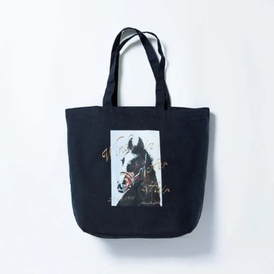 A dark reusable tote bag with long handles and a rectangular horse-head graphic printed on the front.