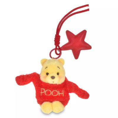 Plush Winnie the Pooh keychain wearing a red sweater labeled POOH, with a red star charm and hanging cord.