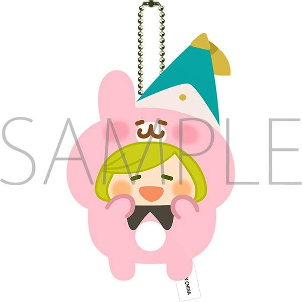 Illustrated keychain plush mascot of Coco wearing a pink animal costume and a teal hat, shown with a ball-chain attached.