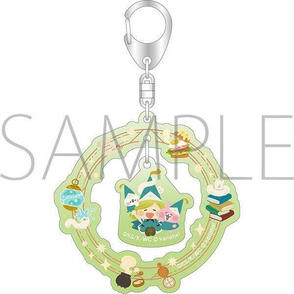 A green illustrated acrylic keychain with a dangling center charm and metal key ring shown with a SAMPLE watermark.
