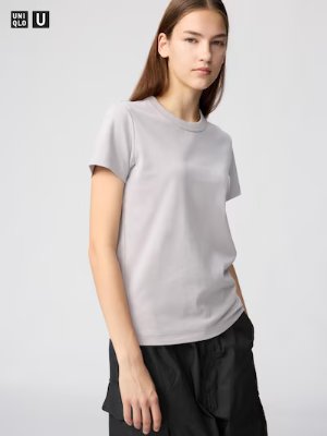 Female model wearing a women's cotton crew neck short-sleeve T-shirt in light gray.