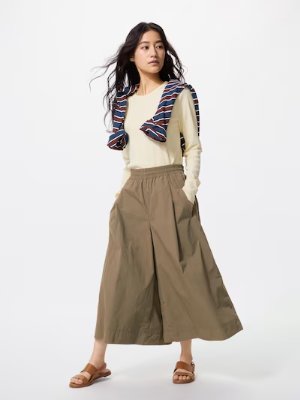 A model wearing the nylon culottes (shorter length) shown full-length on a white background.