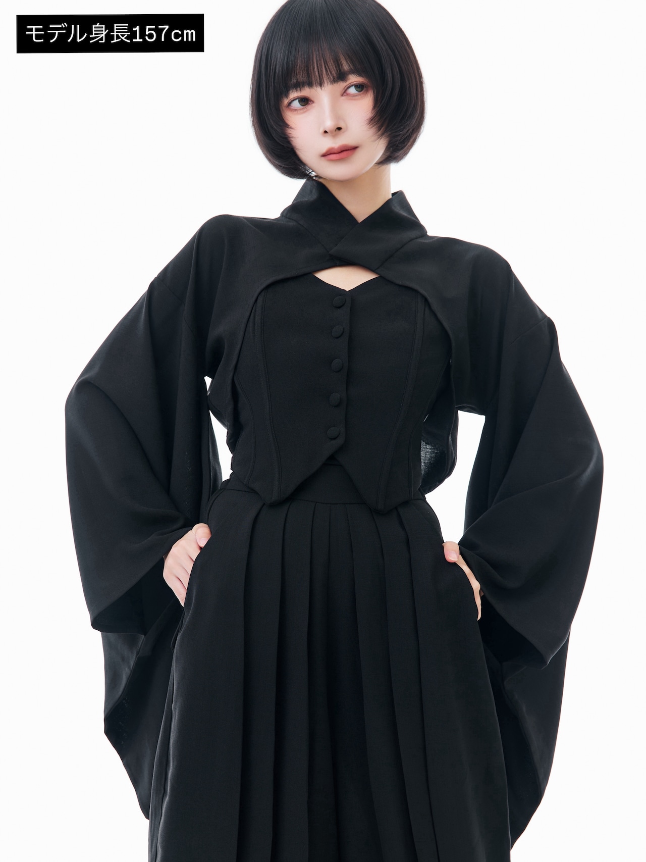 Front view of a model wearing a black super-short kimono-style women's polyester dress.