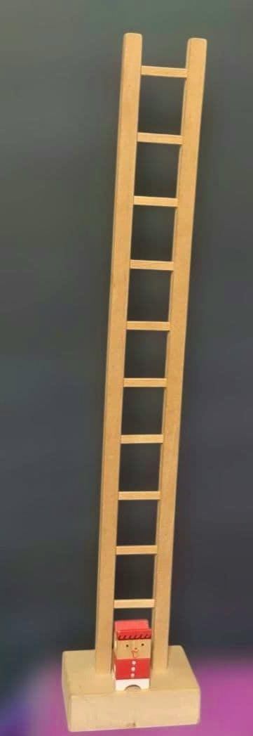 A wooden ladder toy with a rectangular base and a small painted wooden doll positioned at the bottom.