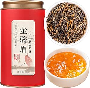 Red cylindrical tin labeled for the tea shown alongside a bowl of loose black tea leaves and a cup of brewed tea.