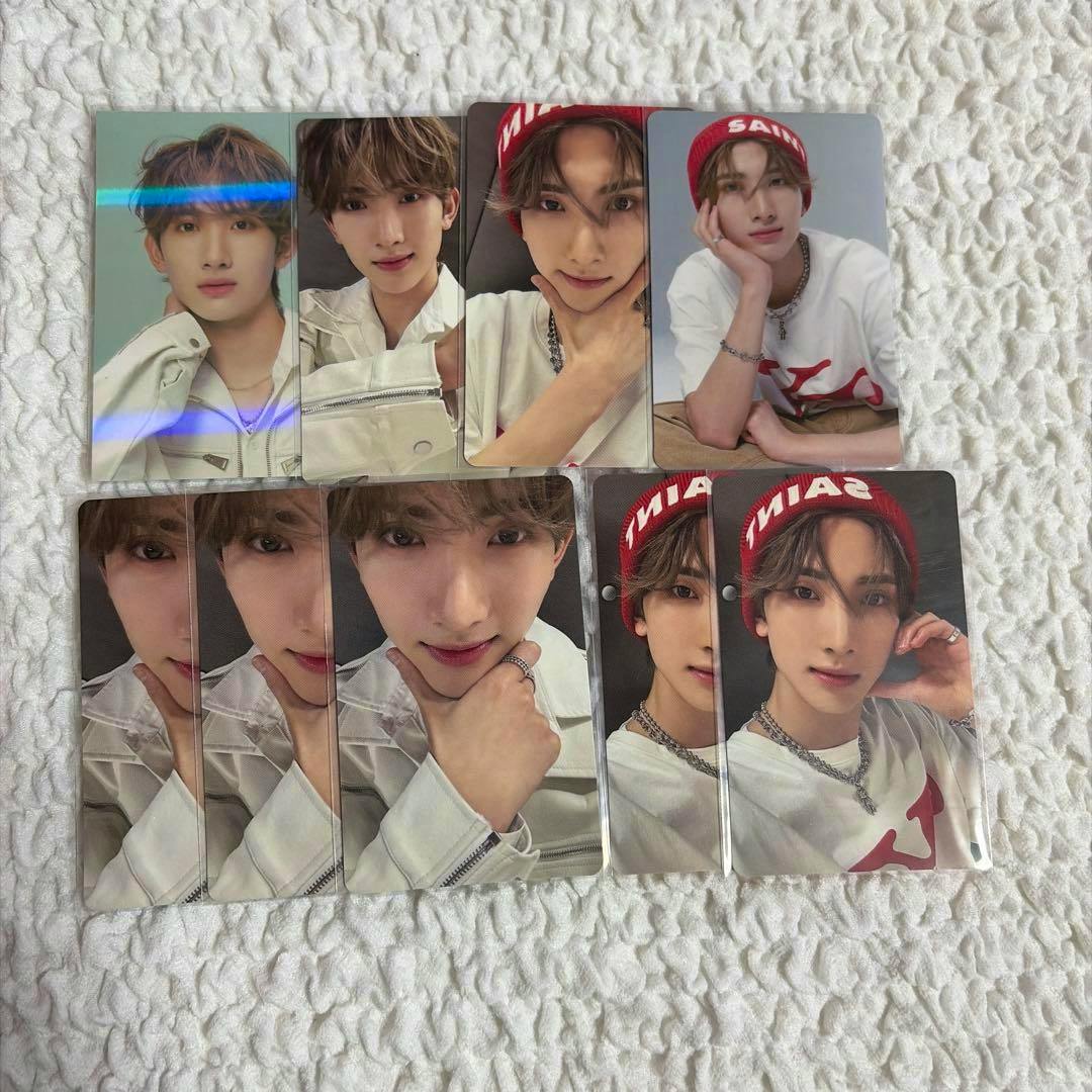 Multiple photocard images of xikers member Seun arranged on a white textured background.