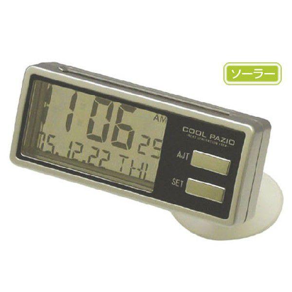 YAC PZ-352 car clock with rectangular LCD showing time and date, two side buttons, and a suction-cup base.