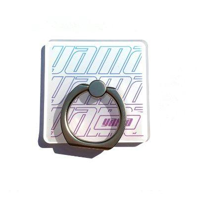 An iron smartphone ring attached to a square branded backing card printed with repeating "yama" logos.