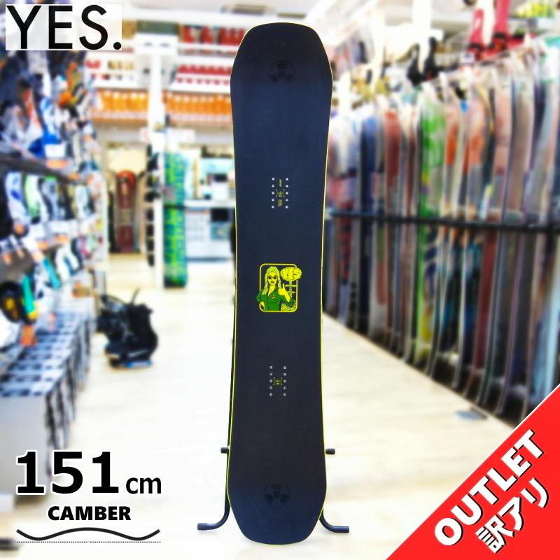 YES Shifter 151 cm snowboard shown upright on a display stand in a shop.