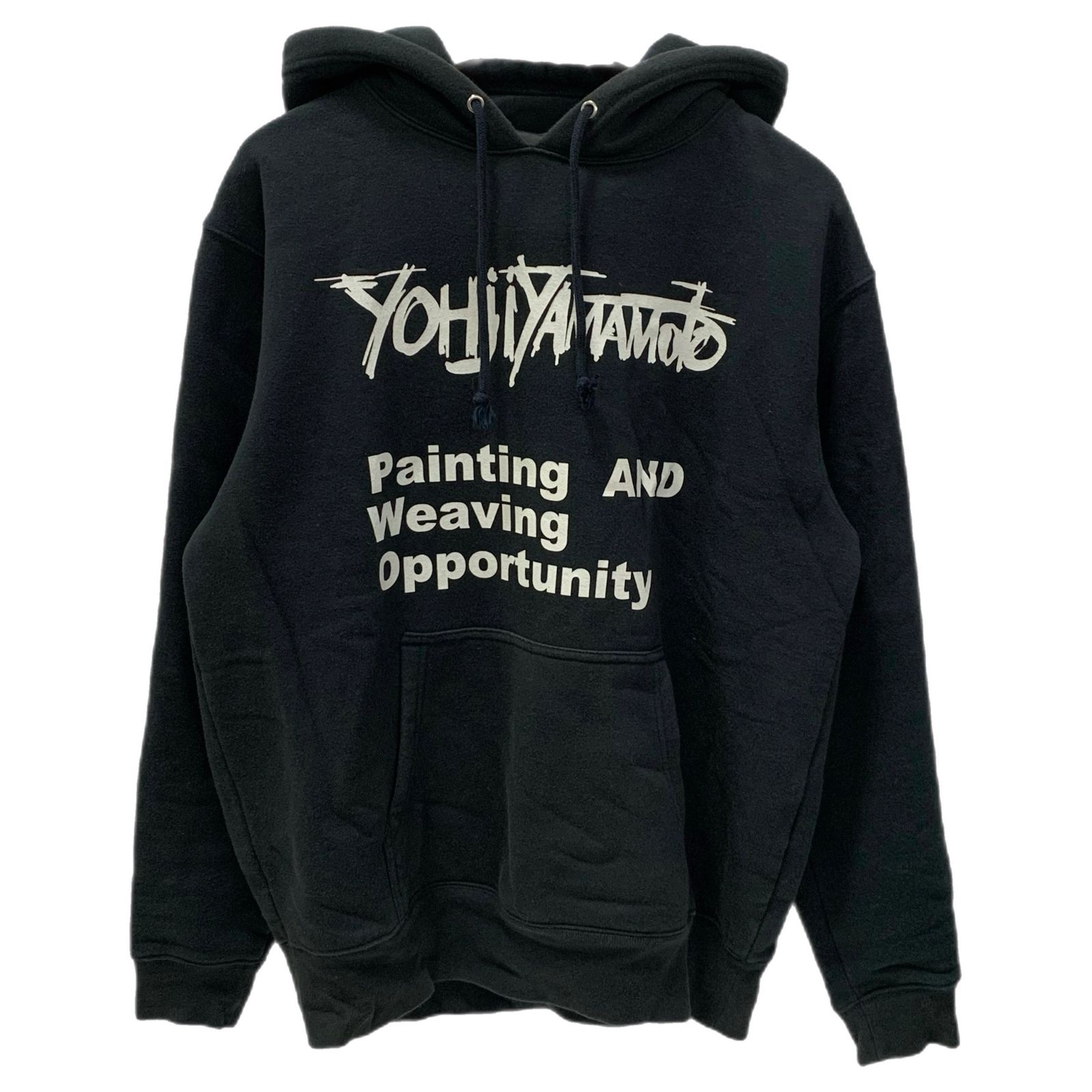Black cotton pullover hoodie with Yohji Yamamoto white chest print and a front kangaroo pocket.