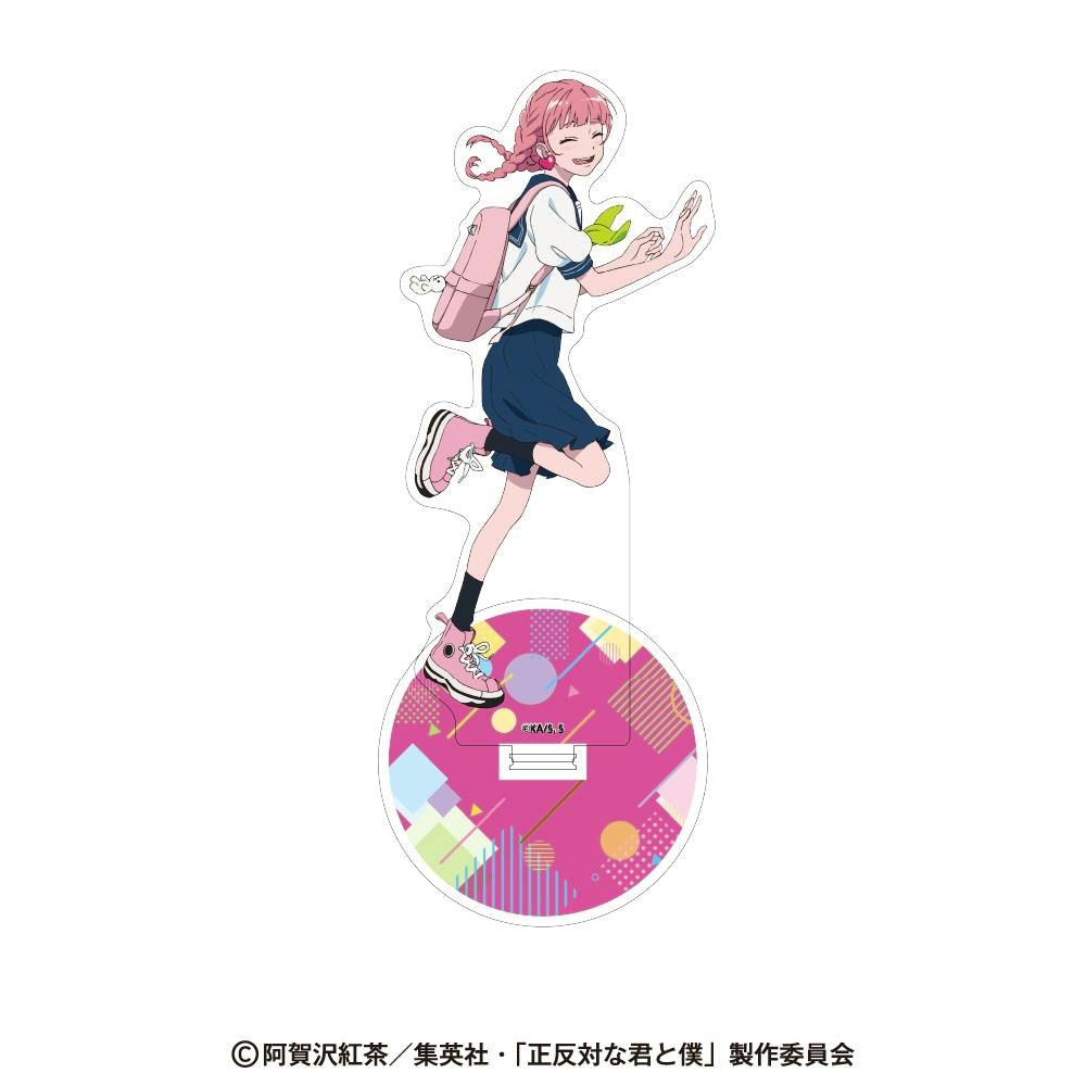 Acrylic decorative stand for 「正反対な君と僕」 showing the character 鈴木 in a sailor school uniform with a pink backpack on a round patterned base.