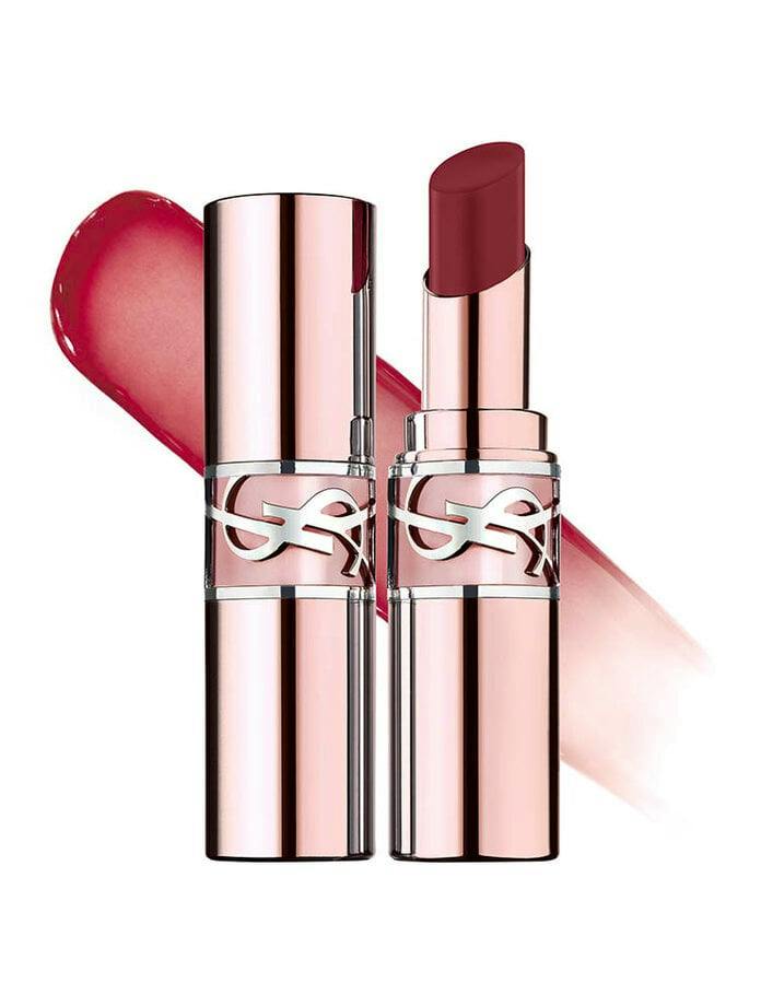 Two rose-gold YSL Love Shine lipstick tubes, one open to show the bullet, with a swatch of the lipstick color behind them.