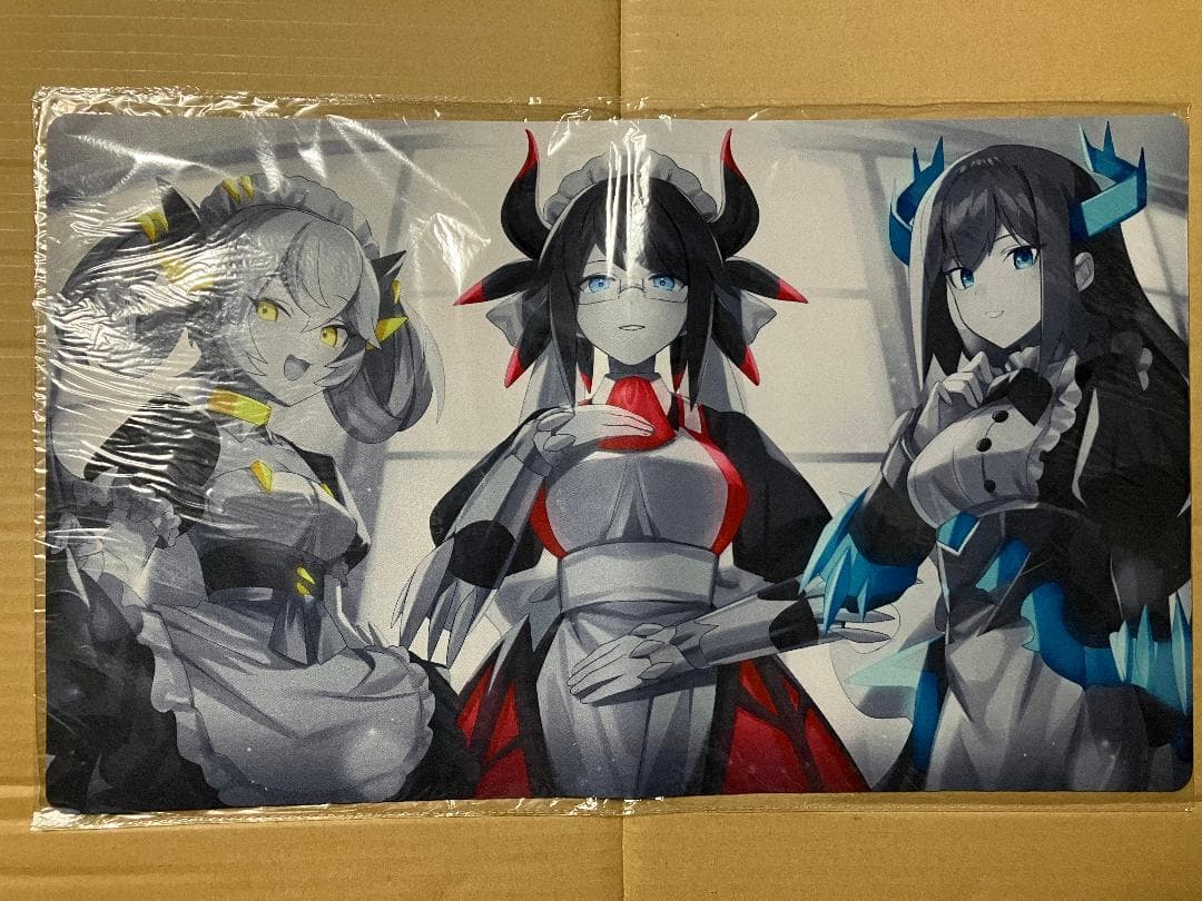 Sealed polyester playmat with monochrome artwork of three dragon-maid characters.