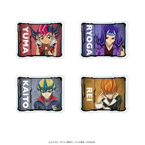 Four rectangular plastic name badges showing YUMA, RYOGA, KAITO, and REI character artwork from Yu‑Gi‑Oh! ZEXAL.