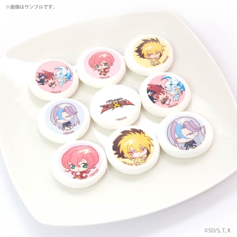 White round marshmallows printed with chibi Yu-Gi-Oh! ZEXAL character illustrations and a central logo on a white plate.