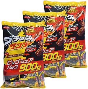 Three large 900 g bags of Yuraku Seika Black Thunder chocolate snack shown side by side.