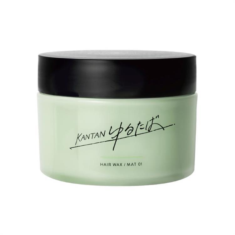Green jar of ゆるたば 90g hair wax with a black lid and printed logo.