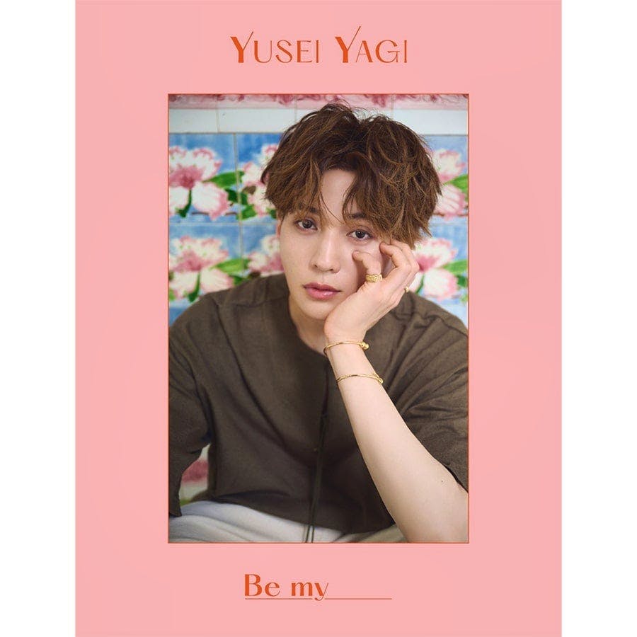 Front cover of a photo book titled 'Be my' showing a portrait of a man on a pink background.