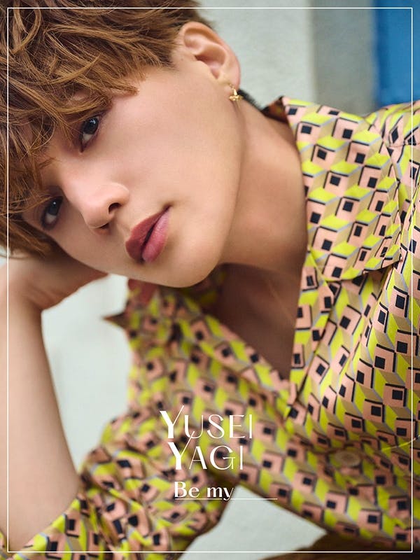Front cover of the photo book showing a close-up portrait of Yusei Yagi wearing a patterned shirt with the title 'Be my'.