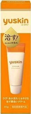 Front of the Yuskin cream 30g box with an orange-and-white design and an illustration of the tube.