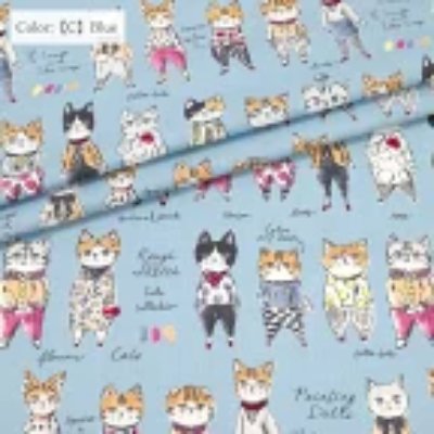 Folded blue fabric printed with small sketch-style standing cat illustrations.