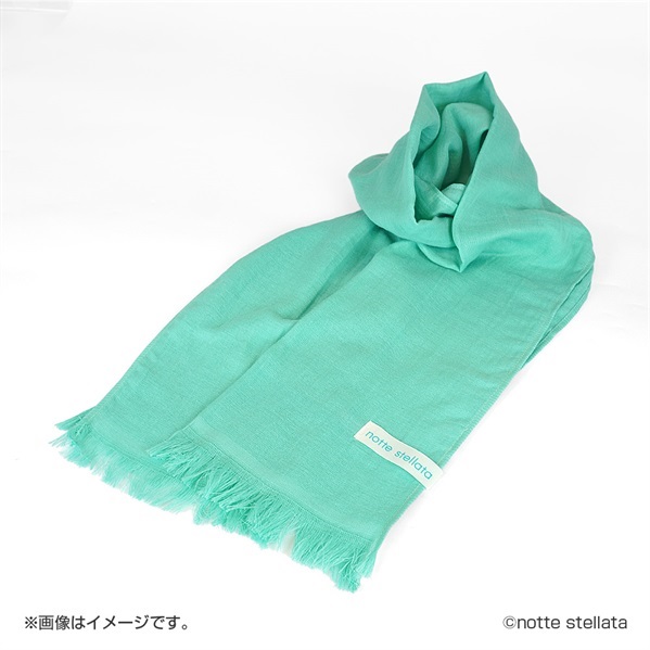 A light green cotton scarf with fringed ends and a visible "notte stellata" label, displayed on a white background.