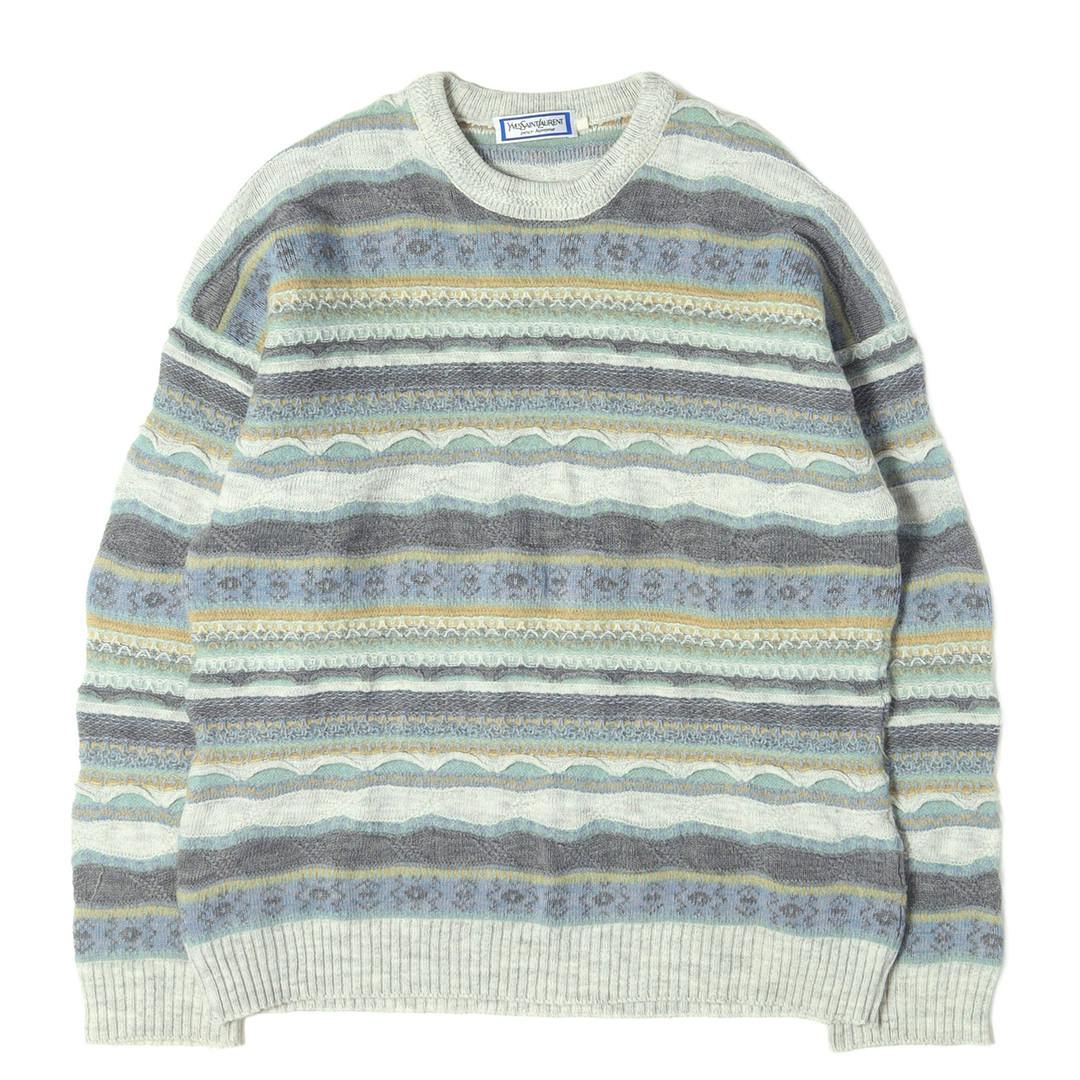 Multicolored 90s geometric jacquard sweater laid flat on a white background showing full front.