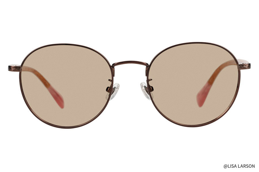 Front view of round brown glasses with brown-tinted lenses and pink temple tips on a white background.