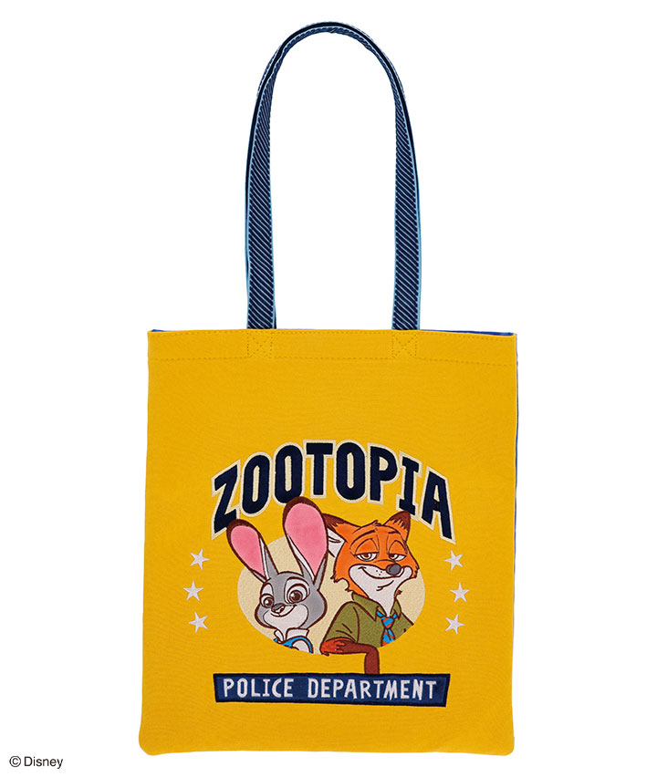 Yellow Zootopia reusable tote bag showing a rabbit and fox character illustration above a 'POLICE DEPARTMENT' panel, with navy striped handles.