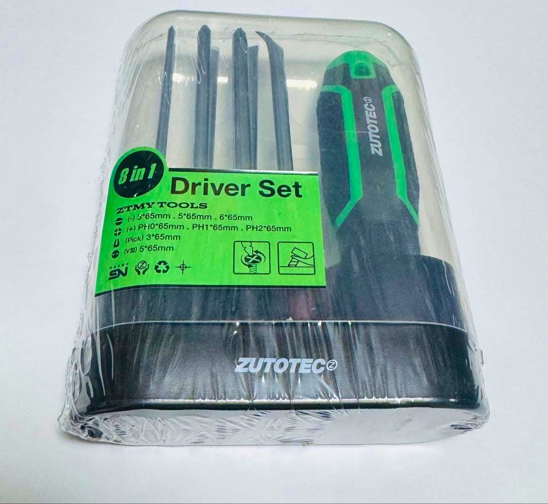Packaged 8-in-1 screwdriver set in a clear plastic blister showing several screwdriver shafts and a black-and-green handle.